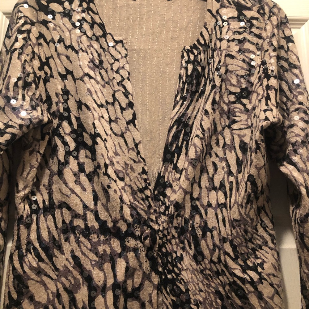 Sale!! Beautiful sequin cardigan with an open style. You can button it. Size M